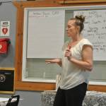 Kenai Peninsula Borough grants administrator Heather Geer explains the Community Assistance Program to community members gathered at the Anchor Point Community and Senior Center on Saturday, Sept. 27, 2025, in Anchor Point, Alaska. (Delcenia Cosman/Homer News)