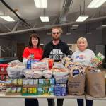 Homer Elks Lodge #2127 Exalted Ruler Jill Hockema (right) is photographed with members of the ARCHES Alaska Food Pantry after a food donation, purchased using grant funds received by the Homer Elks Lodge, was delivered to the pantry in July 2025 in Ninilchik, Alaska. Photo provided by Jill Hockema