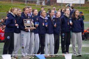 The Homer Mariner girls stand with their trophy after claiming the title at the 2025 ASAA Cross Country Division II Championships at Mike Janecek Trails in Palmer, Alaska, on Saturday, Oct. 4, 2025. Photo courtesy Jake Dye