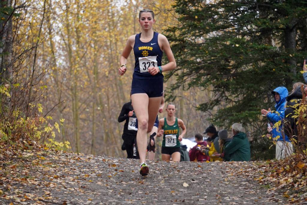 Etta Bynagle races over a hill during the 2025 ASAA Cross Country Division II Championships at Mike Janecek Trails in Palmer, Alaska, on Saturday, Oct. 4, 2025. Photo courtesy Jake Dye