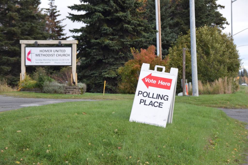 A sign outside the Homer United Methodist Church says Vote Here, designating it as the polling location for Homer No. 2 precinct on Tuesday, Oct. 7, 2025, in Homer, Alaska. (Delcenia Cosman/Homer News)