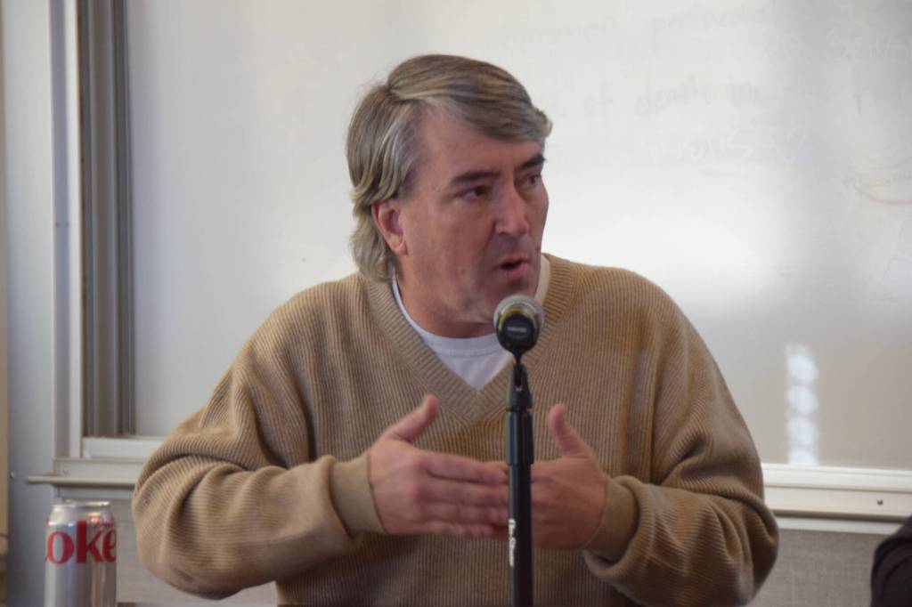 Homer United Methodist Church Reverend Blake Langston answers a question asked during the Citizens Town Hall meeting on Saturday, Oct. 18, 2025, at Kachemak Bay Campus in Homer, Alaska. (Delcenia Cosman/Homer News)