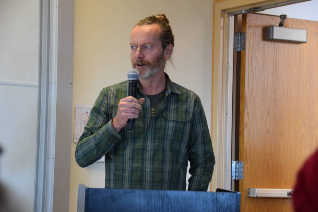 Jason Davis moderates the panel discussion and audience questions during the Citizens Town Hall meeting on Saturday, Oct. 18, 2025, at Kachemak Bay Campus in Homer, Alaska. (Delcenia Cosman/Homer News)