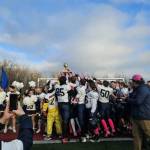 The Homer High School Mariners varsity football team celebrates their victory against the Barrow Whalers at the Division III state championships game on Saturday, Oct. 18, 2025, in Wasilla, Alaska. Photo provided by Justin Zank