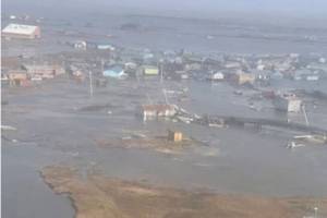 U.S. Coast Guard MH-60 Jayhawk helicopter aircrews conduct overflights of Kipnuk, Alaska, after coastal flooding impacted several western Alaska communities, Oct. 12, 2025. (U.S. Coast Guard photo courtesy of Air Station Kodiak)