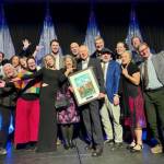 Recipients of the Alaska Travel Industry Association's 2025 Annual Industry Awards celebrate their awards at ATIA's annual convention in Anchorage, Alaska. Photo courtesy of the Alaska Travel Industry Association