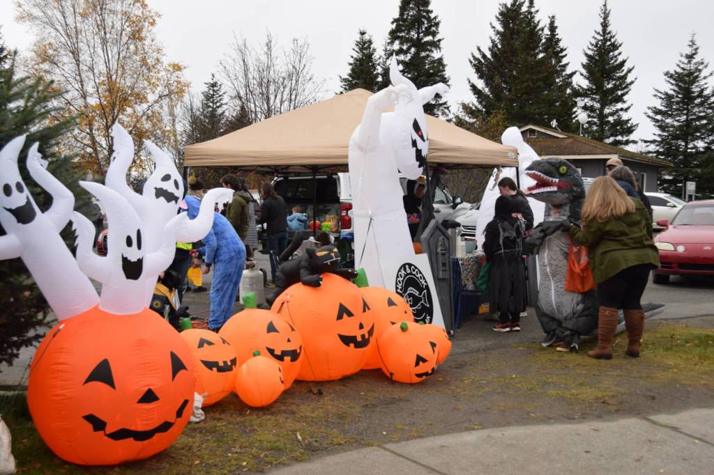 Halloween decorations adorn the parking lot at Alibi during Pioneer Avenue Trick or Treat on Friday, Oct. 31, 2025, in Homer, Alaska. (Delcenia Cosman/Homer News)