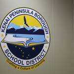 The logo for the Kenai Peninsula Borough School District is displayed inside the George A. Navarre Borough Admin Building on Thursday, July 22, 2021 in Soldotna, Alaska. (Ashlyn OHara/Peninsula Clarion)