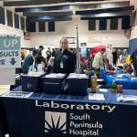 A South Peninsula Hospital employee mans the table for blood test results during the Rotary Health Fair on Saturday, Nov. 8, 2025, at Christian Community Church in Homer, Alaska. Photo provided by South Peninsula Hospital