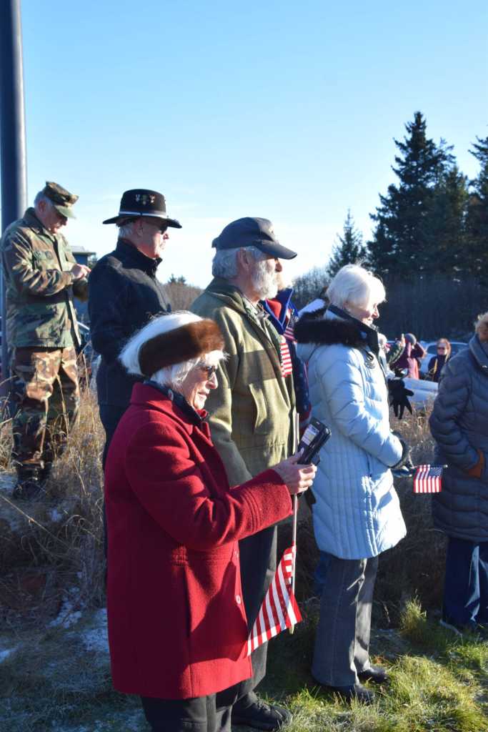 Community members gather at the Alaska Maritime National Wildlife Refuge Visitors Center for a short ceremony following the Veterans Day parade on Tuesday, Nov. 11, 2025, in Homer, Alaska. (Delcenia Cosman/Homer News)