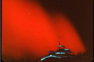 A rare red  aurora is seen over Alaska in February 1958. Photo courtesy of the University of Alaska Fairbanks Geophysical Institute
