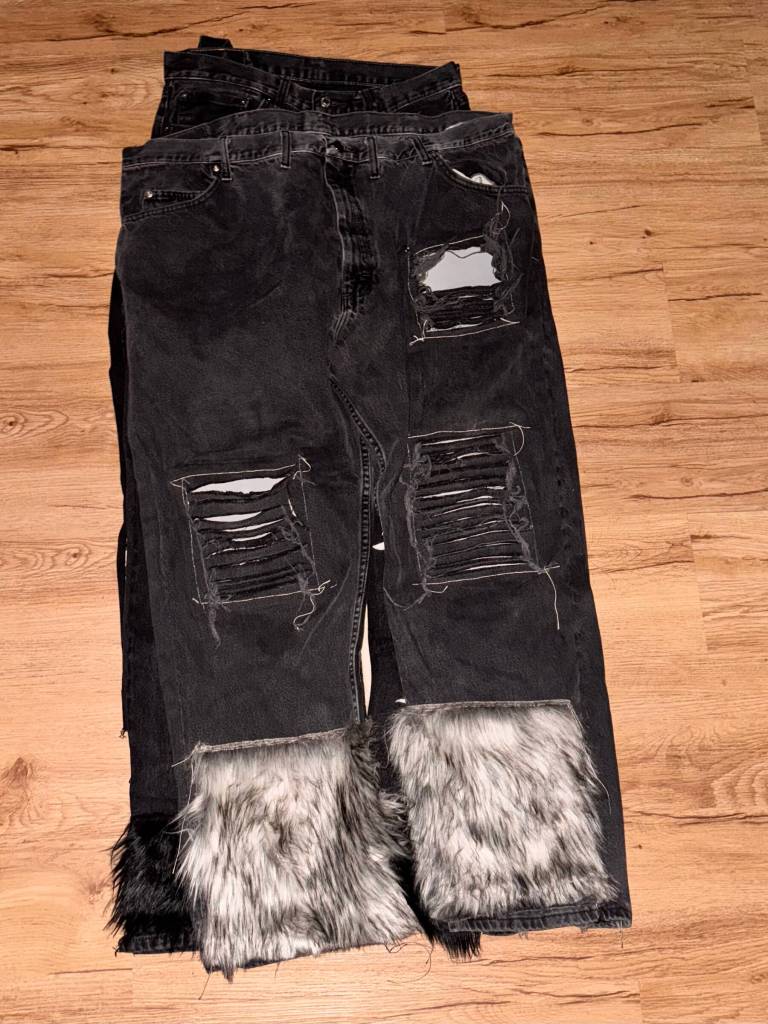 A pair of jeans altered by David Sims features faux leather under rips and faux wolf hide at the bottom. Photo provided by David Sims