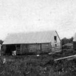 This U.S. Department of Agriculture photograph, from the 1903 report on Alaskan agricultural experiment stations, shows some of the buildings at the Kenai Station, including the superintendents main quarters, at far left.