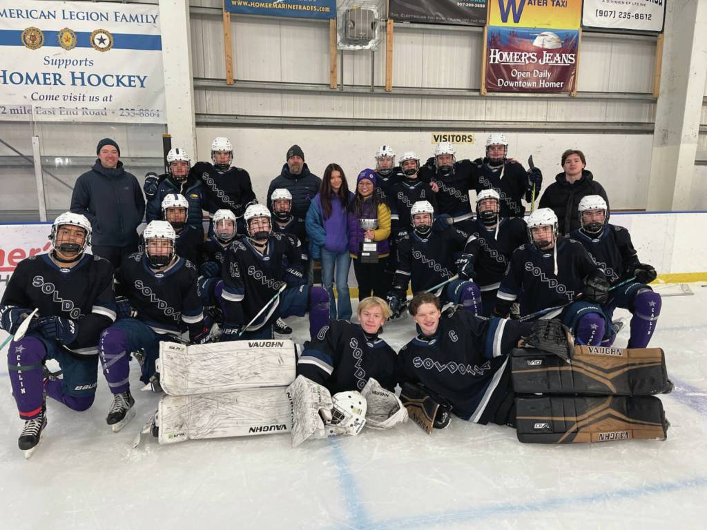 The Soldotna Stars hockey team poses with the Carlin Cup following their 9-1 victory against the Homer Mariners on Saturday, Dec. 13, at the Kevin Bell Arena. Photo courtesy Matt Stineff