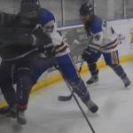 Homer sophomore Nik Moseley (29) checks a Soldotna player during the Carlin Cup home varsity game on Saturday, Dec. 13, 2025, at the Kevin Bell Arena in Homer, Alaska. (Delcenia Cosman/Homer News)