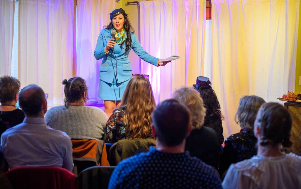 Brianna Allen shares her Boarding Motherhood monologue at The Creative Pursuit for Bodily Autonomy performance in August 2024 in Homer, Alaska. Photo by Rafael de la Uz