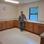 Homer Elks Lodge #2127 Loyal Knight Lenny Eubanks is photographed in the completed kitchen at the Anchor Point Food Pantry in September 2025. Photo provided by Jill Hockema