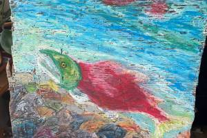 "A Moment of Peace Below the Surface" is an oil pastel piece on reclaimed driftwood by June Denver. Photo provided by June Denver