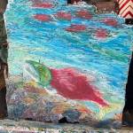 A Moment of Peace Below the Surface is an oil pastel piece on reclaimed driftwood by June Denver. Photo provided by June Denver