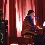 Johnny B., part of the Cosmic Creature Club, plays the piano on The Porcupines stage during the theaters grand re-opening gala on Friday, Jan. 31, 2025<ins>,</ins><ins> in Homer, </ins><ins>Alaska</ins>. (Delcenia Cosman/Homer News)