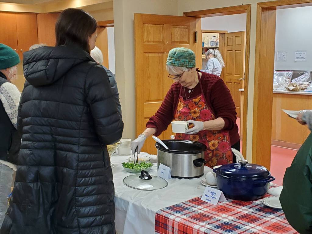 A volunteer dishes up soup during the Homer Community Food Pantrys annual Empty Bowl fundraiser on Friday, Nov. 7, 2025, at the Homer United Methodist Church<ins> in Homer, </ins><ins>Alaska</ins>. (Delcenia Cosman/Homer News)