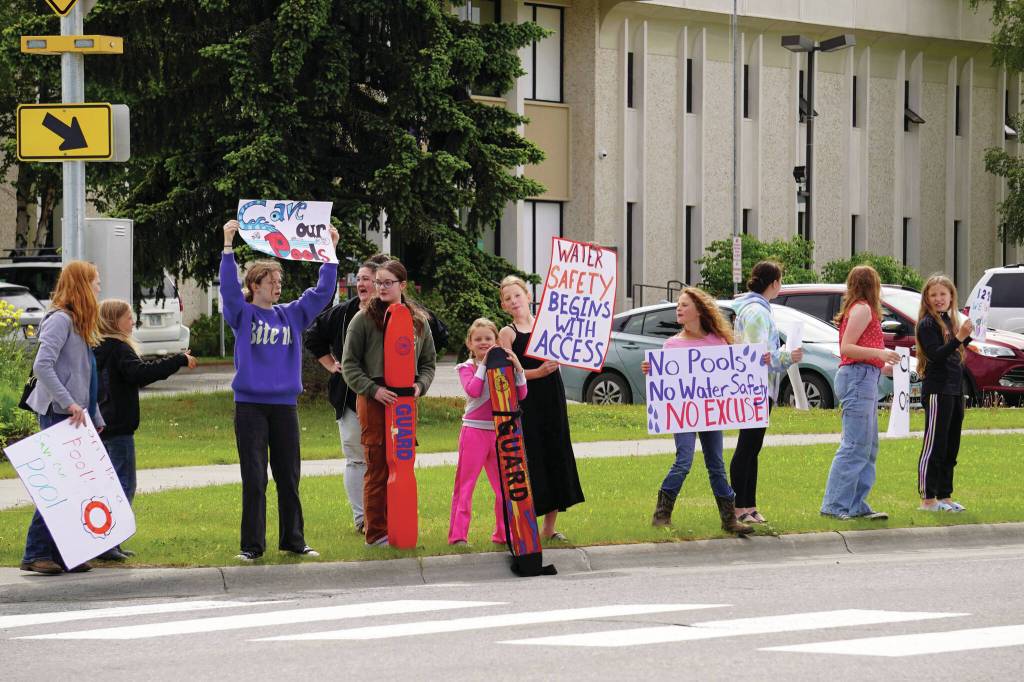 Jake Dye/Peninsula Clarion 
Swimmers and parents protest the proposed closure of Kenai Peninsula Borough School District pools outside of the Kenai Peninsula Borough Administration Building in Soldotna<ins>, Alaska,</ins> on Thursday, June 26, 2025.