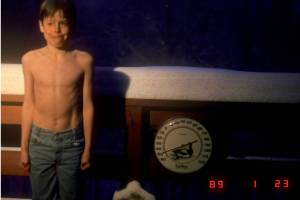 UAF seismologist Carl Tape, age 9, stands outside on his family’s Fairbanks deck at minus 50 degrees F on Jan. 23, 1989. “Carl was ahead of his time,” said Rick Thoman. “Now people pose in front of the UAF sign.” Photo courtesy Walt Tape