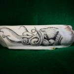 Scrimshaw on a hippopotamus tooth by Conrad Field. Photo provided by Conrad Field
