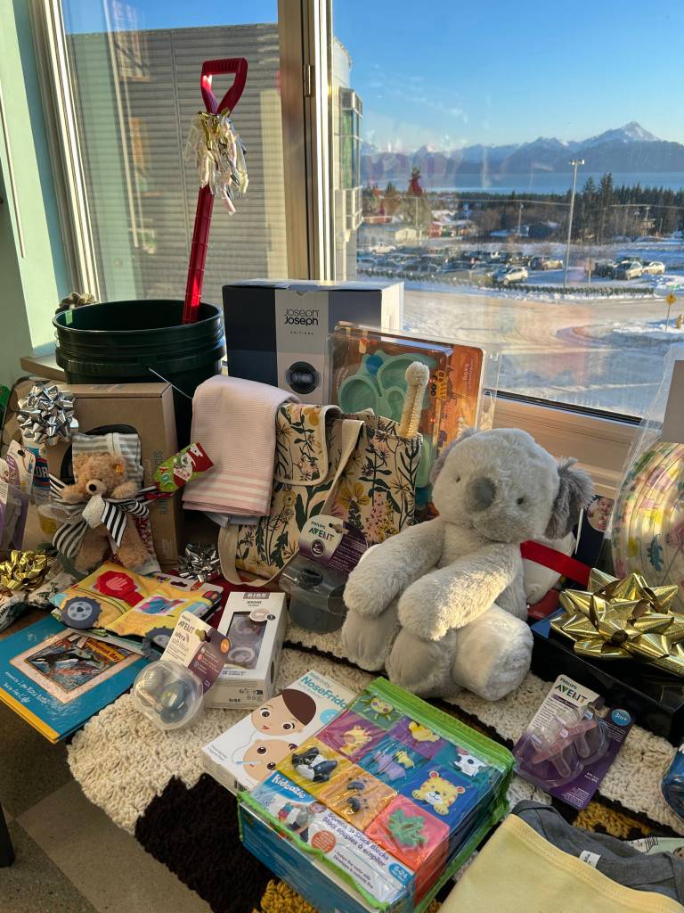 Amanda and Aaron Burdick receive gifts from local businesses and community members following the arrival of their daughter, River Marie, on Jan. 4, 2026, at South Peninsula Hospital in Homer, Alaska. Photo provided by Derotha Ferraro