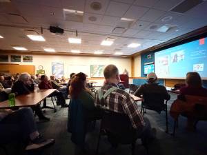 Retired biologist and former Kenai National Wildlife Refuge manager Robin West speaks to nearly 150 attendees gathered in person and virtually for his presentation, Looking Back, Looking Forward, on Tuesday, Jan. 20, 2026. Hosted by the Homer-based nonprofit Friends of Alaska National Wildlife Refuges, Wests talk included anecdotes about his 30 year-long career in the Fish and Wildlife Service and a solo canoe trip that inspired him to write a book about his experiences. Photo courtesy of Poppy Benson/Friends of Alaska National Wildlife Refuges