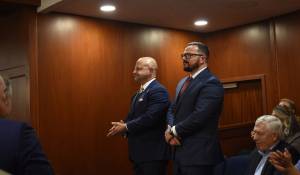 Glenfarne Group CEO and Founder Brendan Duval and Alaska LNG President Adam Prestidge stand in the gallery of the House Chamber during Governor Mike Dunleavys State of the State address on Thurday, Jan. 22.