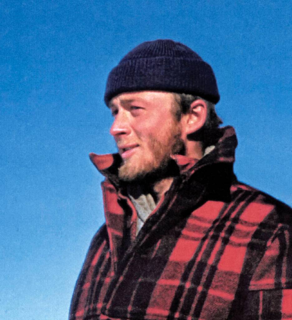 Carl Benson pauses during one of his traverses of Greenland in 1953, when he was 25. Photo courtesy of the UAF Geophysical Institute