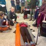 Members of the Kachemak Bay Search and Rescue group receive first aid instruction from MAT+SAR Search and Rescues Mark Stigar (center left) on Jan. 31, 2026, during a training weekend at Kachemak Emergency Services station in Homer, Alaska. Photo courtesy Kasey Aderhold