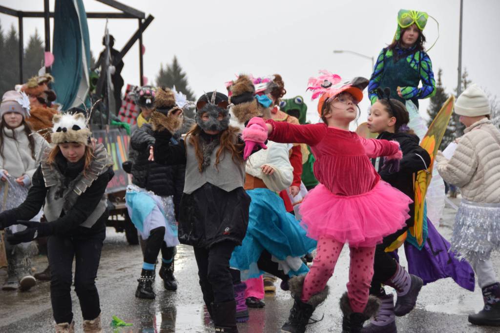 Youth members of the Motivity Dance Collective dance on Pioneer Avenue during the Winter Carnival Parade on Saturday, Feb. 14, 2026, in Homer, Alaska. (Delcenia Cosman/Homer News)