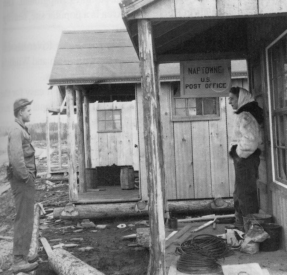Walt Pedersen photo from Alaskas Kenai Peninsula: The Road Weve Traveled, by the Kenai Peninsula Historical Association
Alex Petrovich chats with Laura Tyson in front of the new Naptowne Post Office in 1949.