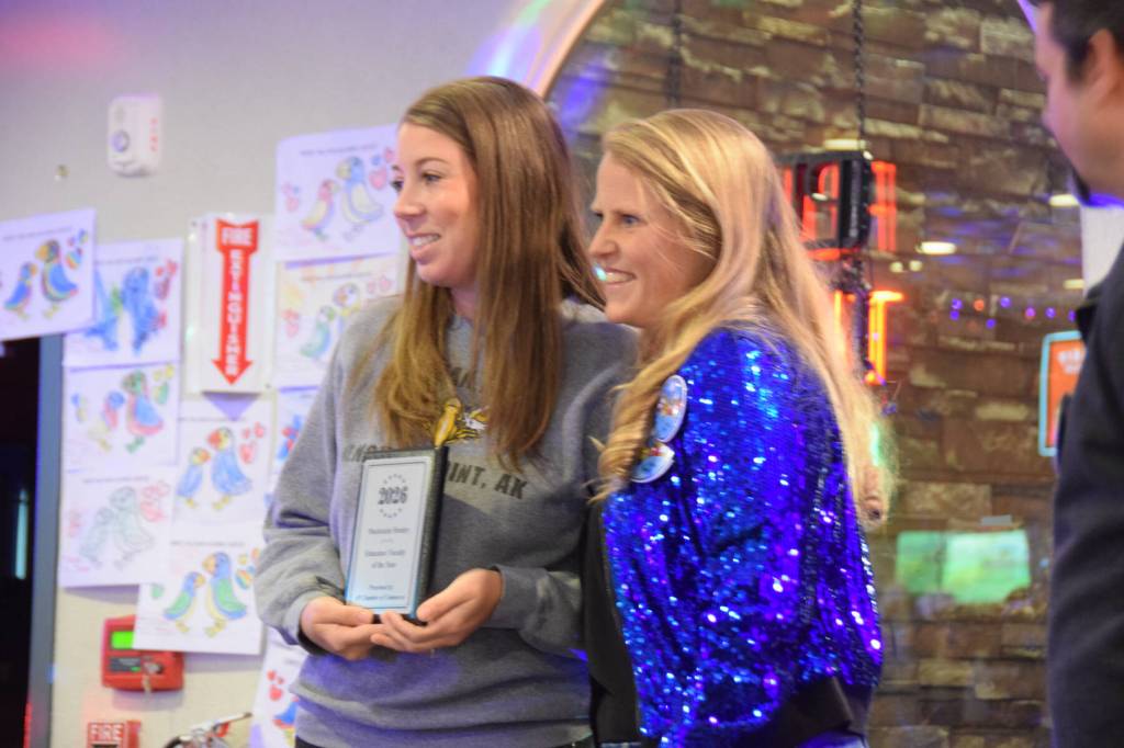 Photos by Delcenia Cosman/Homer News
Chapman School principal Heidi Stokes (right) presents the Educator/Faculty of the Year award to Chapman librarian Mackenzie Henley during the Community Awards on Saturday, Feb. 28<ins>, 2026, at the Angry Salmon</ins> in Anchor Point<ins>, Alaska</ins>.