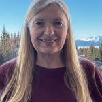 Local artist Carole Miller, photographed on her back deck in March 2026, is the newest member of the Ptarmigan Arts family. Photo provided by Carole Miller