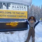 Photo courtesy Ned Rozell
Alaska Goldpanners baseball team mascot Happy Boy (aka Chris Carlson of Fairbanks) poses in front of the University of Alaska Fairbanks temperature sign on the morning of March 1<ins>, 2026</ins>.