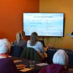 Homer City Manager Melissa Jacobsen (right) gives the State of the City presentation during a Homer Chamber of Commerce members luncheon on Tuesday, March 24, 2026, at The Room at Fat Olives in Homer, Alaska. (Delcenia Cosman/Homer News)