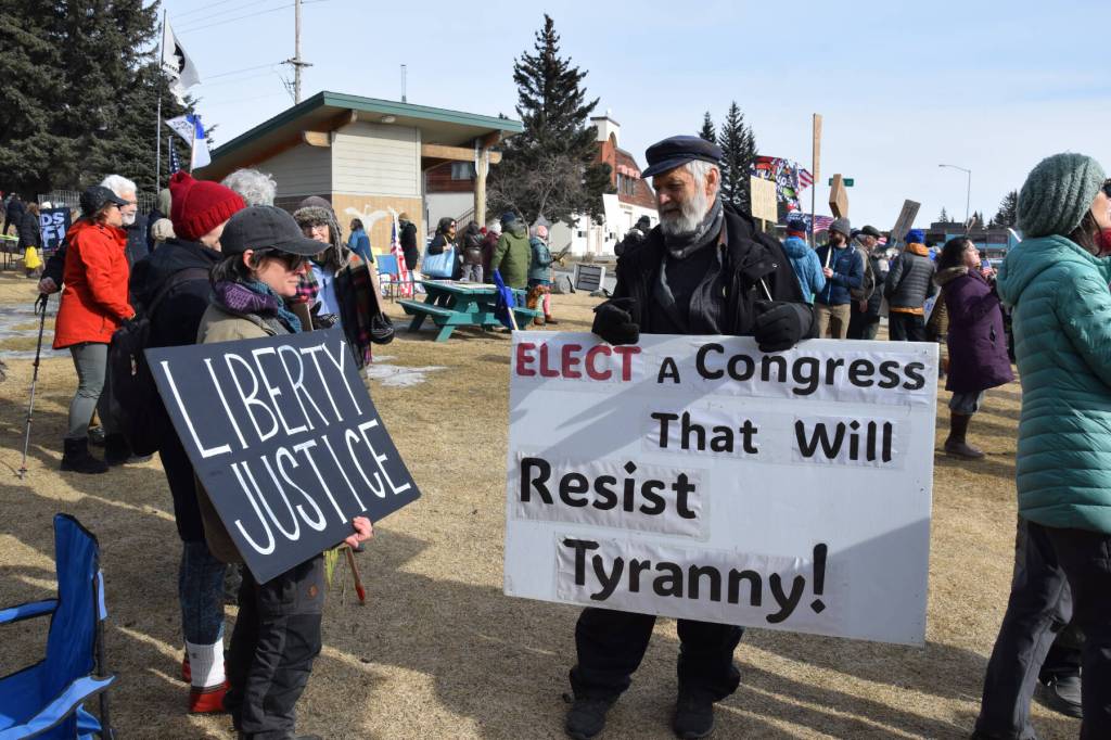 Former Alaska State House Rep. Paul Seaton holds up a sign that reads Elect a Congress that will resist tyranny! during the No Kings protest on Saturday, March 28, 2026, in Homer, Alaska. (Delcenia Cosman/Homer News)