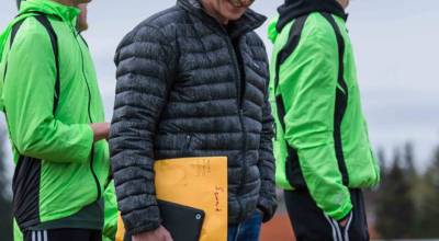 Photo provided by Dan Marshall
Former Seward High School head coach Dan Marshall (center) is photographed with the members of the track team in this undated photo.