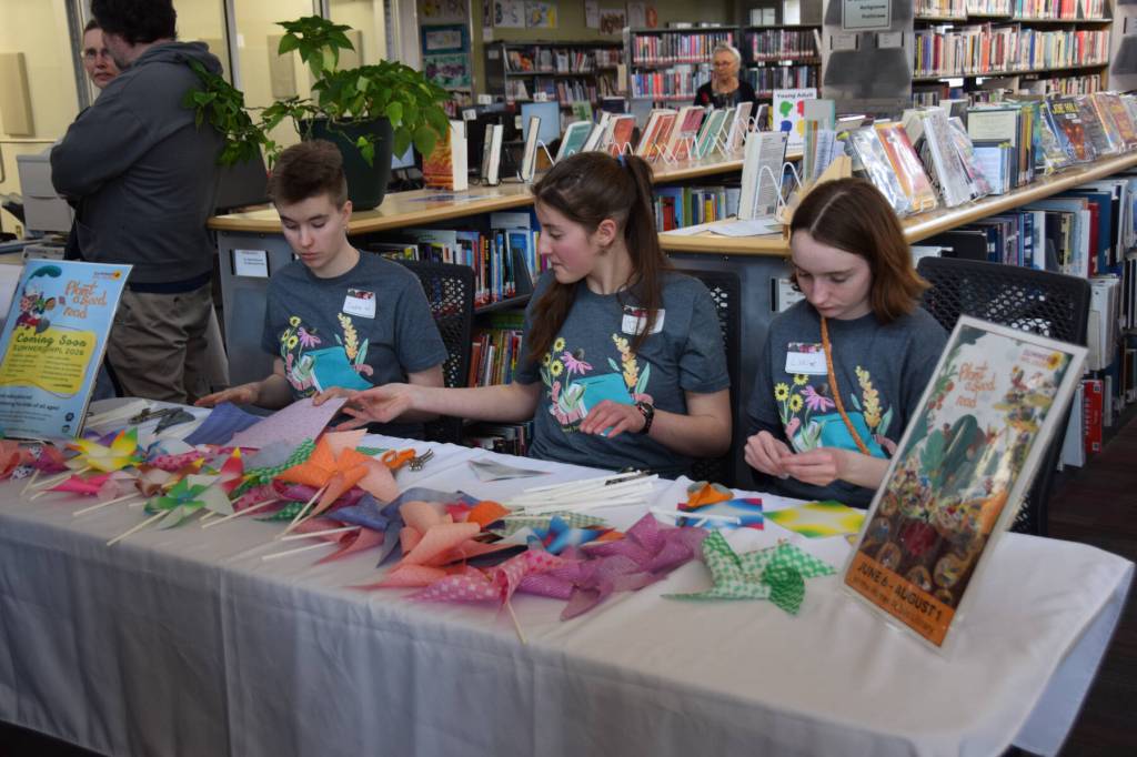 Youth volunteers promote the Homer Public Librarys upcoming summer reading program during the Celebration of Lifelong Learning on Saturday, March 28, 2026, in Homer, Alaska. (Delcenia Cosman/Homer News)
