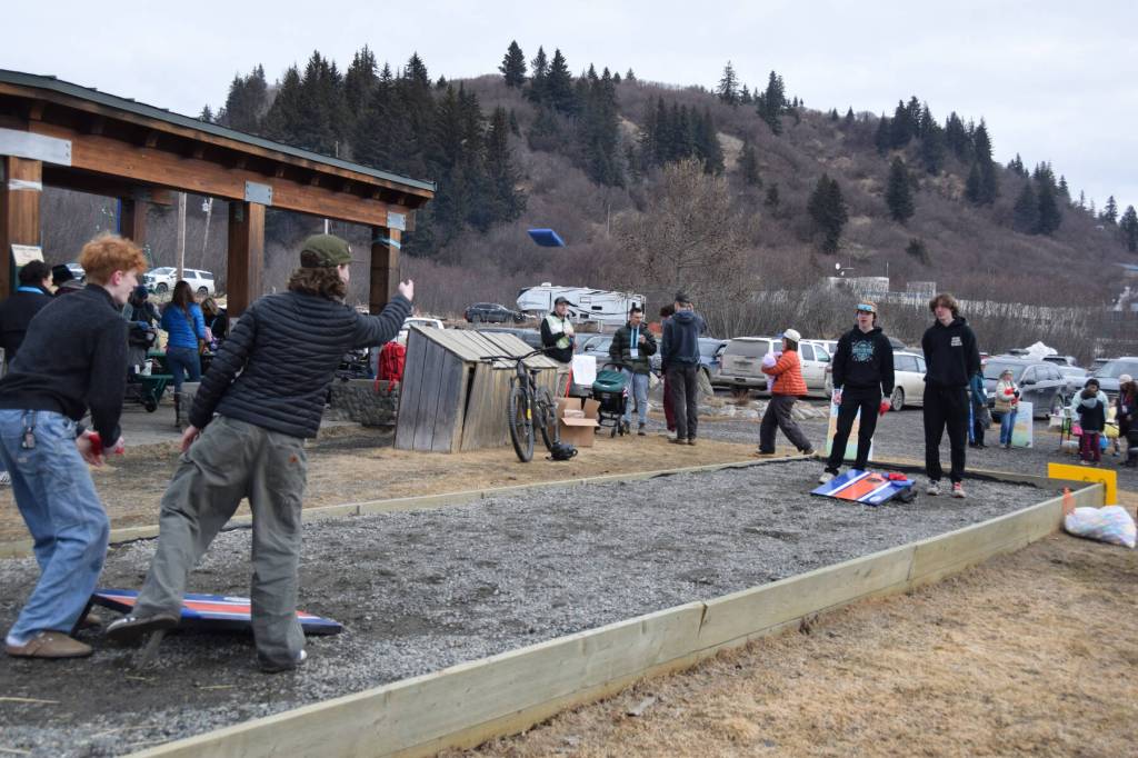 Youth play games during the community Easter egg hunt hosted by Church on the Rock Homer on Saturday, April 4, 2026, at Karen Hornaday Park in Homer, Alaska. (Delcenia Cosman/Homer News)