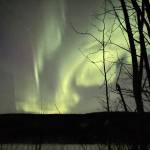 A display of aurora erupts at midnight on April 4, 2026, from above a campsite near the Yuki River, a tributary of the Yukon. Photo courtesy Ned Rozell