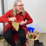 Willow Jones crafts a turkey wing-style Appalachian broom at the 2024 Ready, Set, Art! fundraiser, and will be onsite again this year on Saturday, April 25, 2026, at Grace Ridge Brewing in Homer, Alaska. (Delcenia Cosman/Homer News)