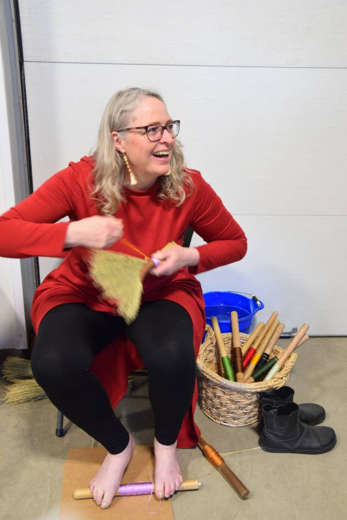 Willow Jones crafts a turkey wing-style Appalachian broom at the 2024 Ready, Set, Art! fundraiser, and will be onsite again this year on Saturday, April 25, 2026, at Grace Ridge Brewing in Homer, Alaska. (Delcenia Cosman/Homer News)