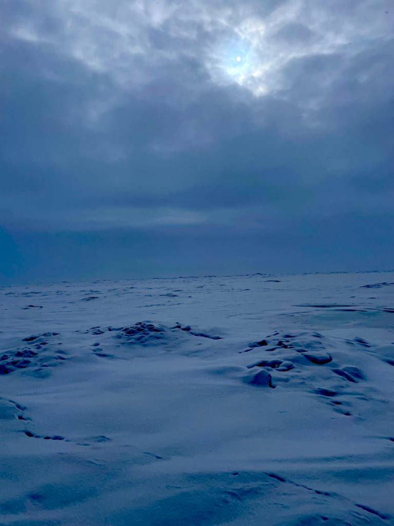 The sea ice fused to the shoreline at the village of Unalakleet marked the stopping point of a 515-mile bike ride from Fairbanks for Ned Rozell and his friend Forest Wagner. (Photo by Ned Rozell)