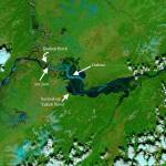 NASAs Terra satellite captured this image of the flooded Yukon River on May 28, 2013. An ice jam at Bishop Rock backed water into the village of Galena, swamping much of the town with 7 feet of water for several days. (NASA image courtesy LANCE MODIS Rapid Response)