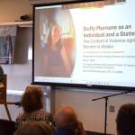 Ingrid Johnson, associate professor in the University of Alaska Fairbanks Department of Justice & Womens Gender and Sexuality Studies, gives a presentation on violence against women in Alaska during the Duffys Journey to Justice community conversation at Kachemak Bay Campus on Saturday, May 2, 2026, in Homer, Alaska. (Delcenia Cosman/Homer News)