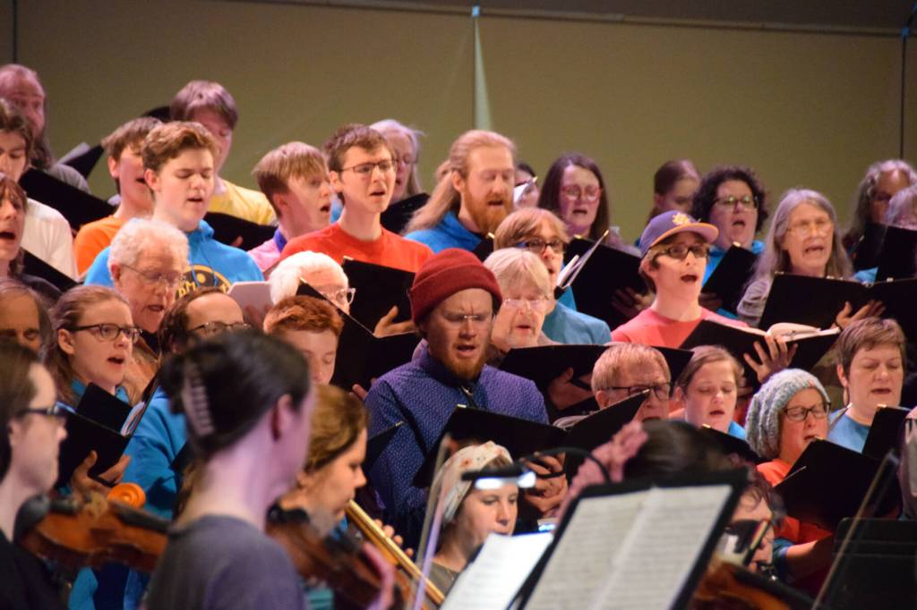 Members of the Homer High School Concert Choir and Kenai Peninsula Community Choir rehearse the Mozart Requiem on Thursday, April 30, 2026, on the Homer High School Mariner Theatre stage in Homer, Alaska. (Delcenia Cosman/Homer News)